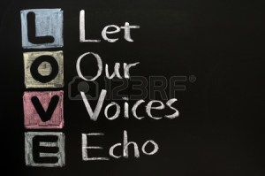 11714621-love-acronym-let-our-voices-echo-on-a-blackboard-with-words-written-in-chalk